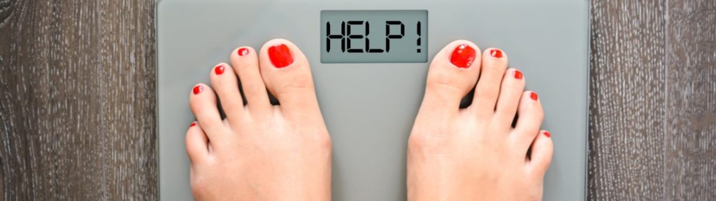 lose weight concept with person on a scale measuring kilograms picture id500874808
