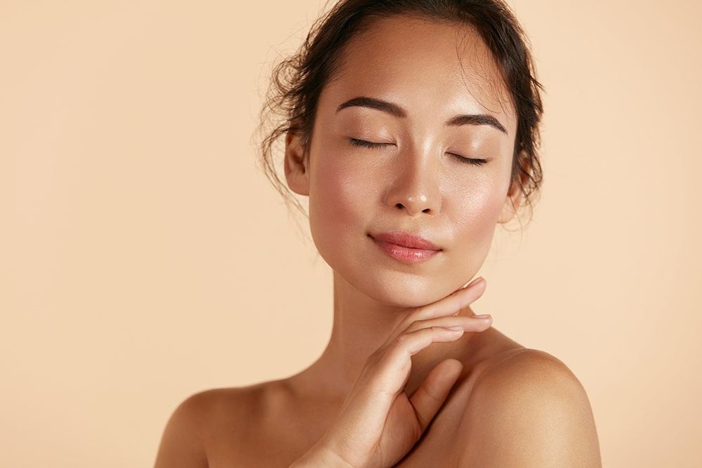 woman touching face