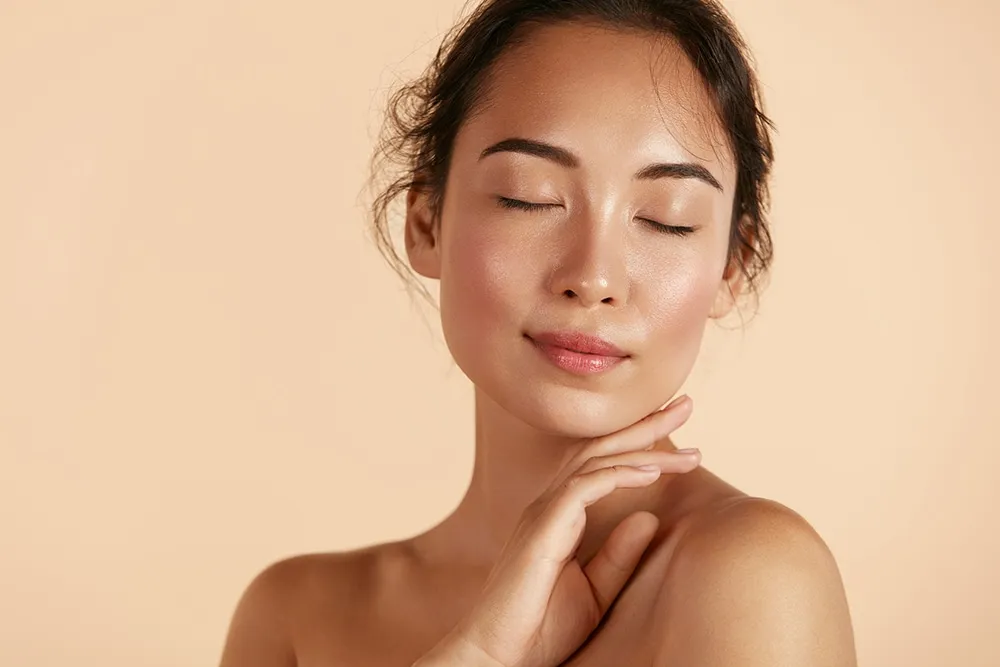 woman touching face